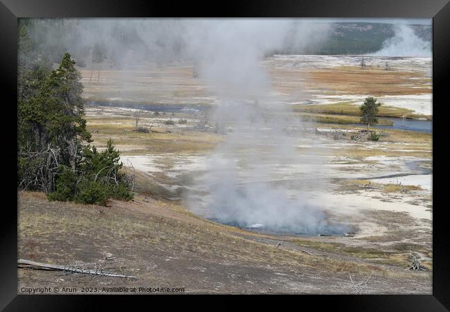Geysers at Yellowstone national park in Wyoming USA Framed Print by Arun 