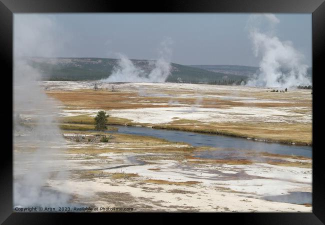 Geysers at Yellowstone national park in Wyoming USA Framed Print by Arun 