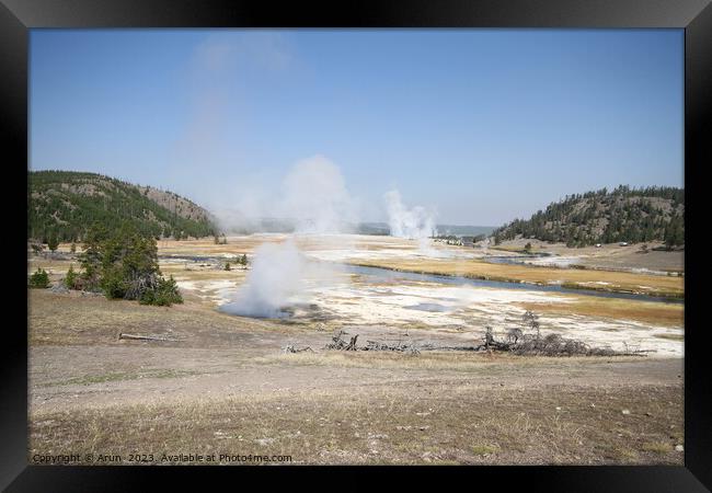 Geysers at Yellowstone national park in Wyoming USA Framed Print by Arun 