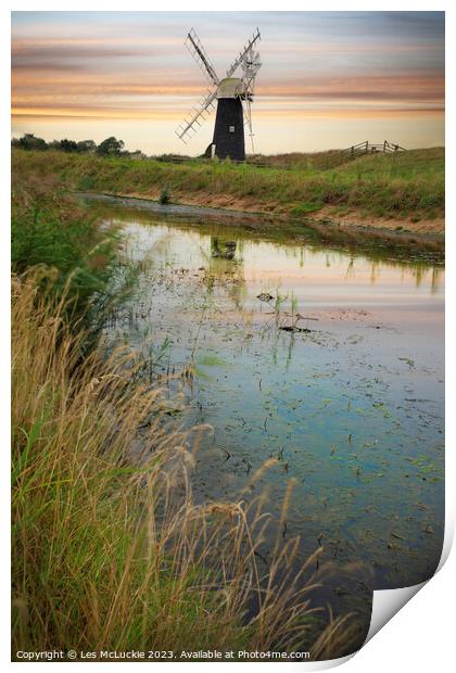 Windmill reflections Print by Les McLuckie