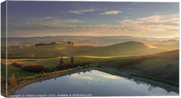 Lake and rolling hills. Castelfiorentino, Tuscany, Italy Canvas Print by Stefano Orazzini