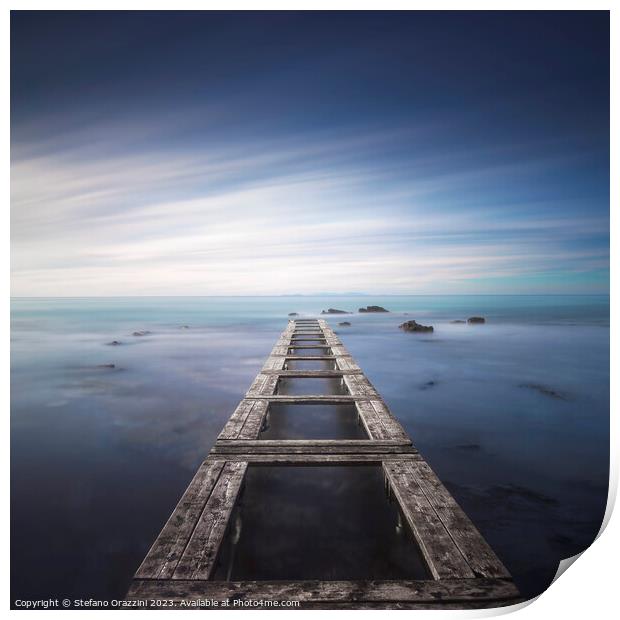 Wooden pier remains in a blue sea. Long Exposure. Print by Stefano Orazzini