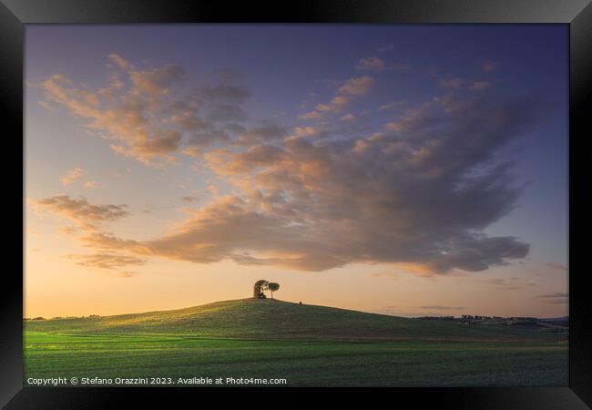 Tuscany, Maremma landscape. Old windmill and trees on top of the Framed Print by Stefano Orazzini