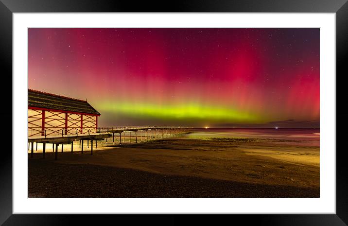 Aurora Borealis over Saltburn pier Framed Mounted Print by Kevin Winter