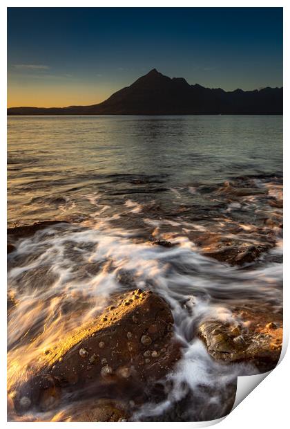 Waves crashing over the rocks on Elgol beach Print by Kevin Winter