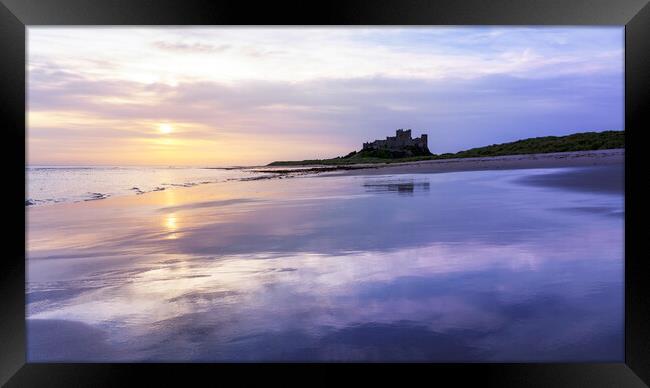 Sunrise Reflections on Bamburgh Beach  Framed Print by Anthony McGeever