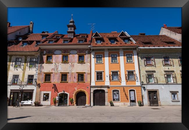 Skofja Loka Old Town Houses At Mestni Trg Framed Print by Artur Bogacki