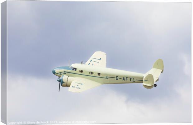 Lockheed Electra in a cloudy sky Canvas Print by Steve de Roeck