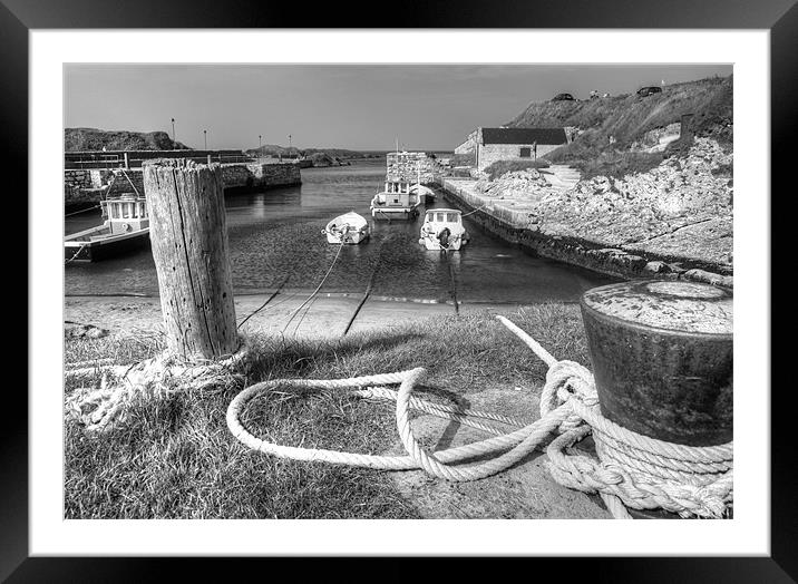 Tied up in Ballintoy Harbour Framed Mounted Print by David McFarland