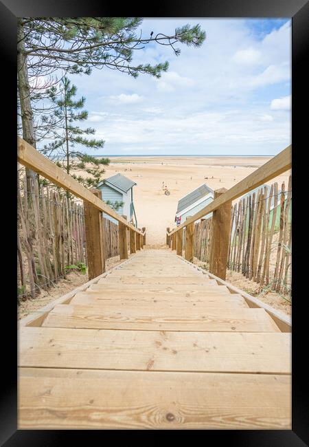 Steps down to beach huts at Wells Framed Print by Jason Wells