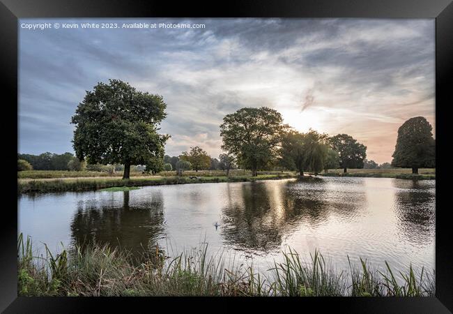 Dramatic mornings in autumn at Bushy Park ponds Framed Print by Kevin White