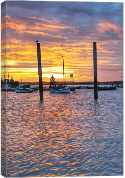 Brightlingsea sunrise colours over the harbour  Canvas Print by Tony lopez