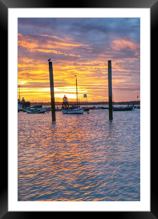 Brightlingsea sunrise colours over the harbour  Framed Mounted Print by Tony lopez