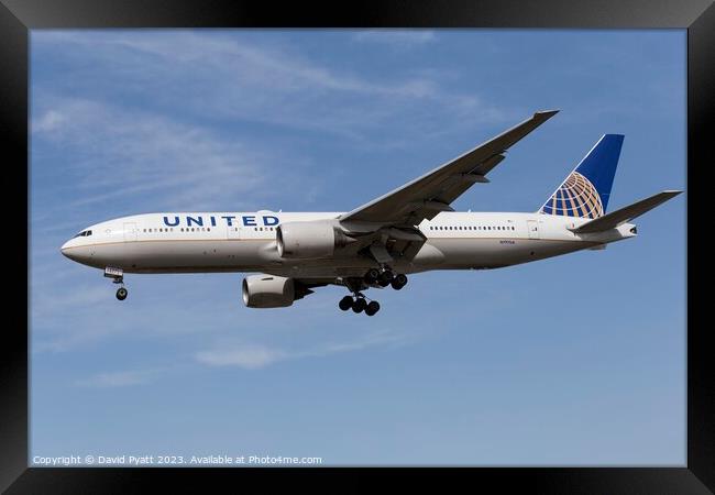 United Airlines Boeing 777-222        Framed Print by David Pyatt