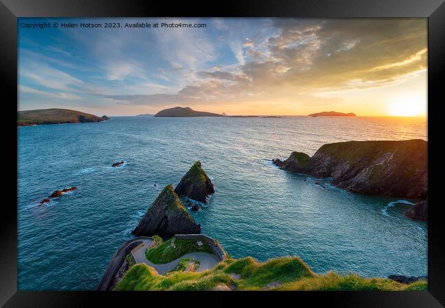 Sunset over Dunquin Pier near Dingle  Framed Print by Helen Hotson