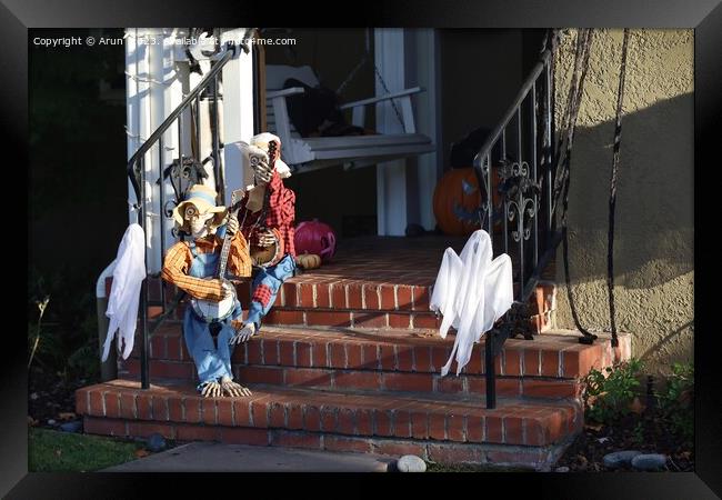 Halloween decorations on streets Framed Print by Arun 