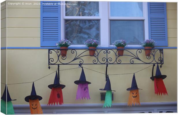 Halloween decorations on streets Canvas Print by Arun 