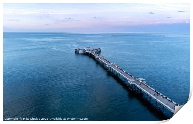 Pier in calm waters Print by Mike Shields
