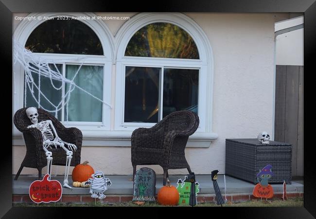 Halloween decorations on streets Framed Print by Arun 