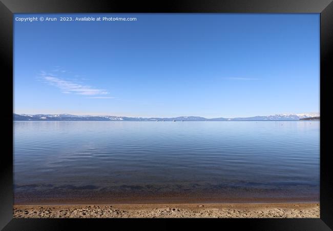 Lake Tahoe in the winter Framed Print by Arun 