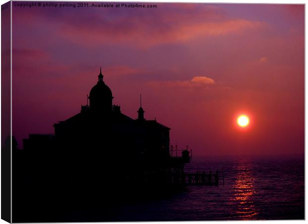 Eastbourne pier silhouette at sunrise. Canvas Print by camera man