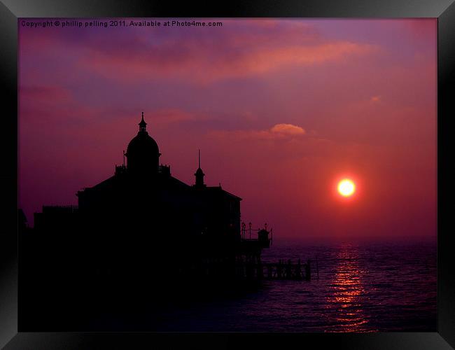 Eastbourne pier silhouette at sunrise. Framed Print by camera man
