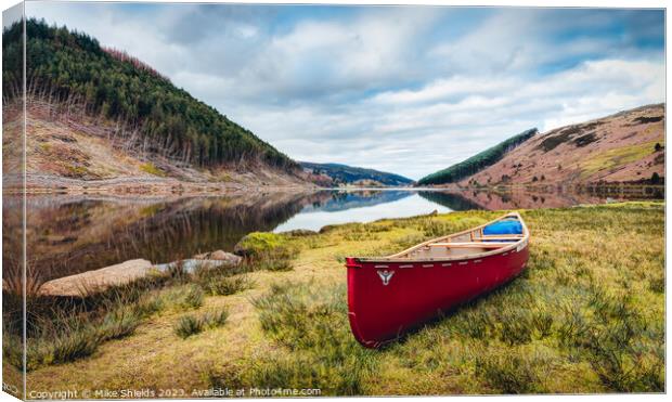 Lakeside Canoe  Canvas Print by Mike Shields