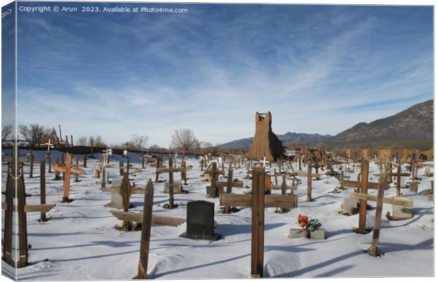 Graveyard in Taos Pueblo in New Mexico Canvas Print by Arun 