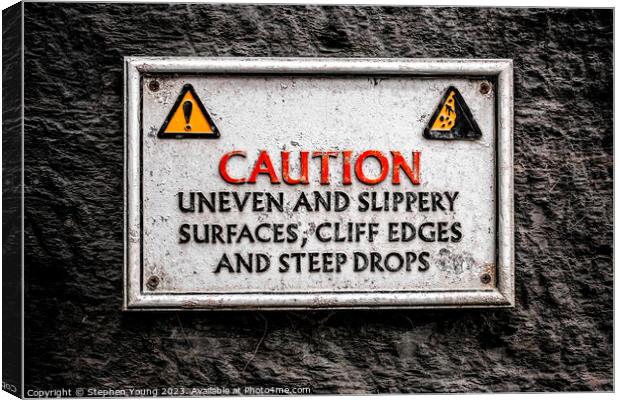 Weathered Caution: Sign of the Sea Wall Canvas Print by Stephen Young