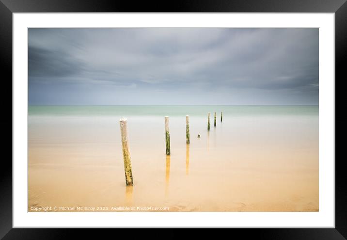 Beach Posts at Castlerock. Framed Mounted Print by Michael Mc Elroy