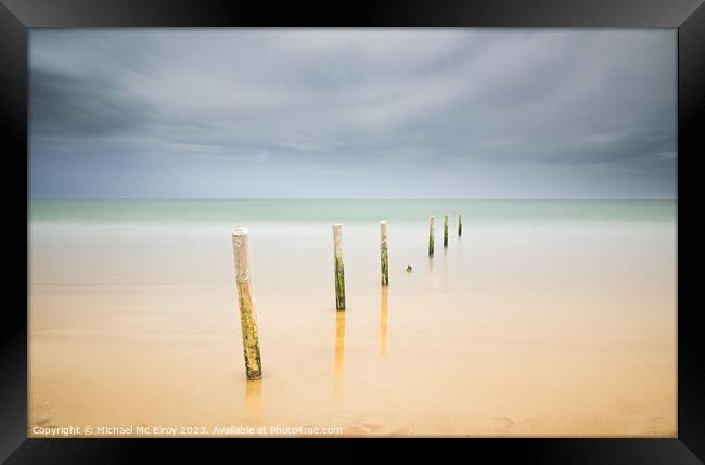 Beach Posts at Castlerock. Framed Print by Michael Mc Elroy