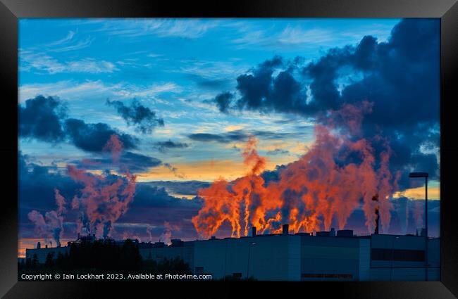 Sunset on factory smoke Framed Print by Iain Lockhart