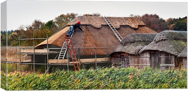 Thatching a boat house at Hickling Canvas Print by Stephen Mole