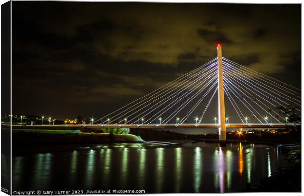 Northern Spire At Night Canvas Print by Gary Turner