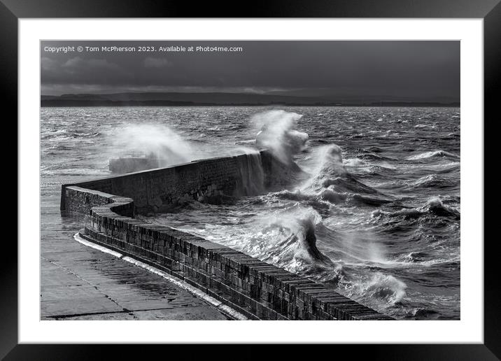 Huge waves break over Burghead pier during sea storm on the Moray Firth. Framed Mounted Print by Tom McPherson