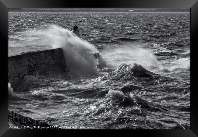 Burghead Pier takes a Battering Framed Print by Tom McPherson