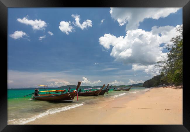 Long tail boat moored at Ao Nang Beach Framed Print by Kevin Hellon