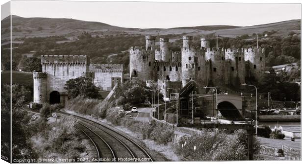 Conwy Castle and railway line  Black and White Canvas Print by Mark Chesters