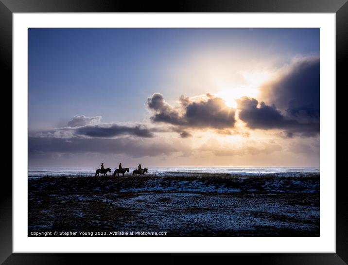 Silhouettes in the Storm: Icelandic Riders and Ponies Framed Mounted Print by Stephen Young