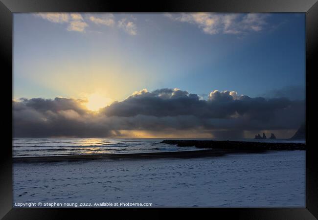 Arctic Elegance: Icelandic Sunset Over Snowy Shore Framed Print by Stephen Young