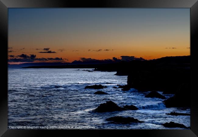 Amber Skies and Icy Waters: Icelandic Sunset Framed Print by Stephen Young