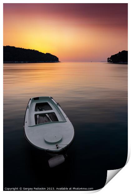 Fishing boat in a sea, near coast. Sunset time. Print by Sergey Fedoskin