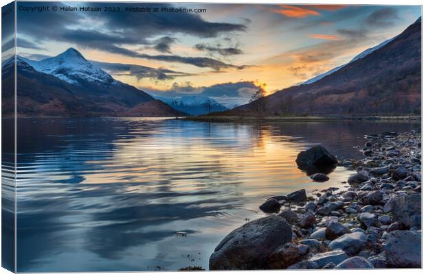 Beautiful sunset with snow capped mountains from the shores of L Canvas Print by Helen Hotson