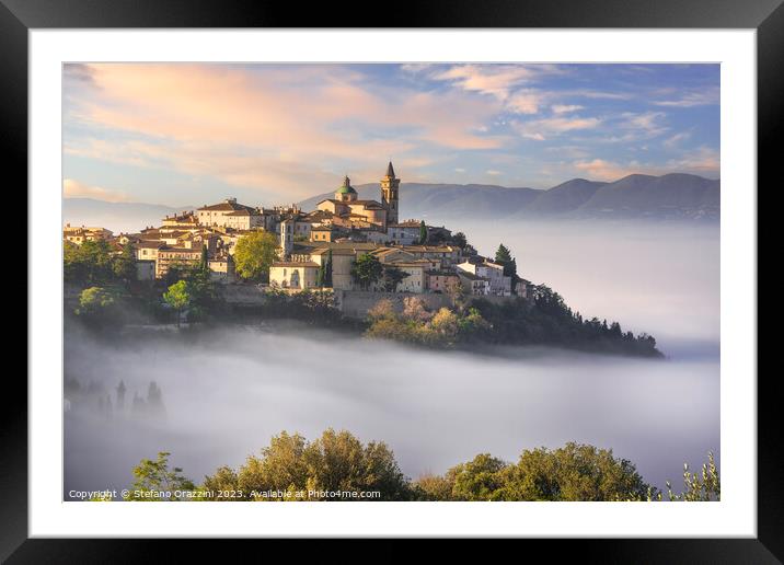 Trevi picturesque village in a foggy morning. Umbria, Italy Framed Mounted Print by Stefano Orazzini