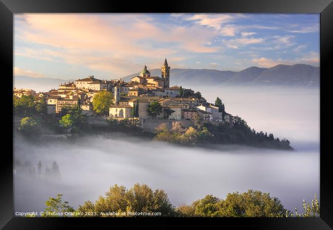 Trevi picturesque village in a foggy morning. Umbria, Italy Framed Print by Stefano Orazzini