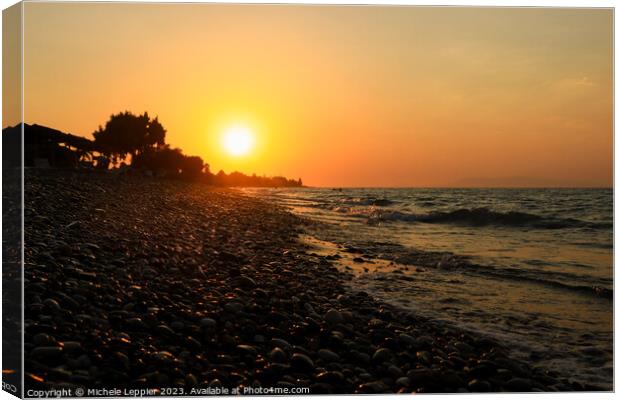 Rhodes Beach Sunset and Pebbles Canvas Print by Michele Leppier