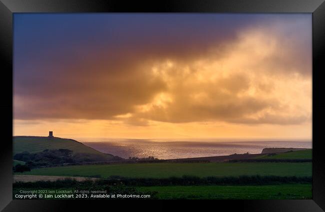 Sunset over Kimmeridge Bay looking out to Portland Framed Print by Iain Lockhart