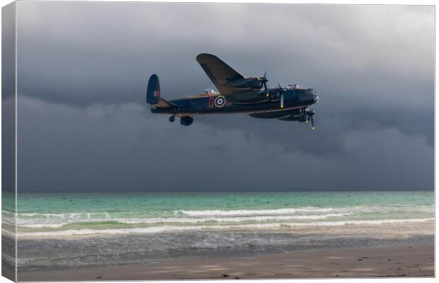 Lancaster bomber over the sea and under a dark, cloudy sky Canvas Print by Kevin Hellon