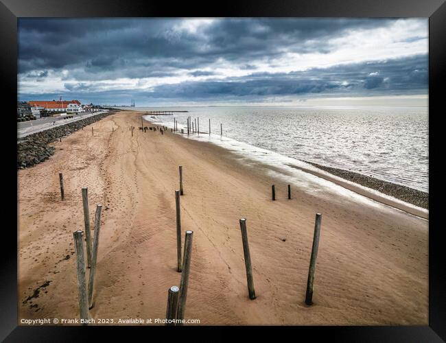 Poles on Hjerting public beach promenade in Esbjerg, Denmark Framed Print by Frank Bach