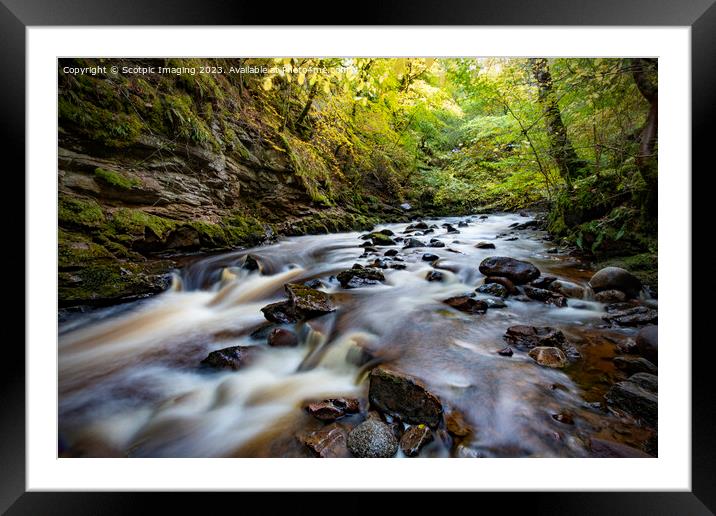 Slow exposure river with stones Framed Mounted Print by A Chisholm